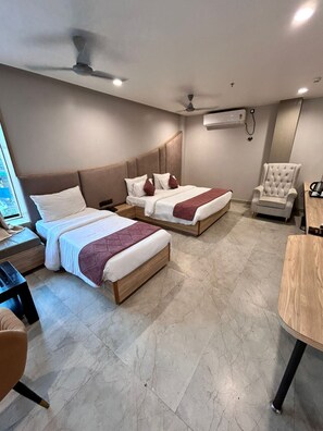 Family Suite, City View | In-room safe, laptop workspace, iron/ironing board, free WiFi - Hotel Cosmos (Bhubaneshwar)