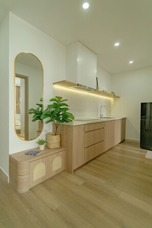 Deluxe Apartment, 1 Bedroom, Balcony, Pool View | Interior - Ti Tach Home in Nera Garden Hue (Thua Thien Hue)
