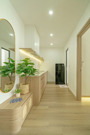 Deluxe Apartment, 1 Bedroom, Balcony, Pool View | Interior - Ti Tach Home in Nera Garden Hue (Thua Thien Hue)