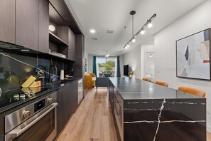 Fridge, oven, stovetop, dishwasher - 1BR Suite w/ Private Balcony | Pool + Terrace + Restaurant | The Code (Austin)