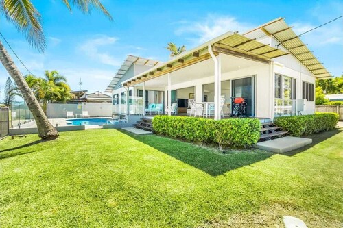 Luxury beachfront escape: Ocean views and poolside living!