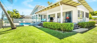 Luxury beachfront escape: Ocean views and poolside living!