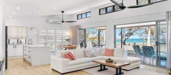 Luxury beachfront escape: Ocean views and poolside living!