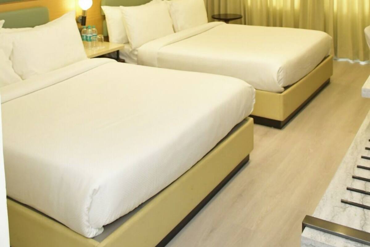 Family Quadruple Room | Premium bedding, down comforters, memory foam beds, minibar