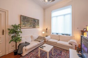 Habitación, 1 habitación | Sala de estar | Libros