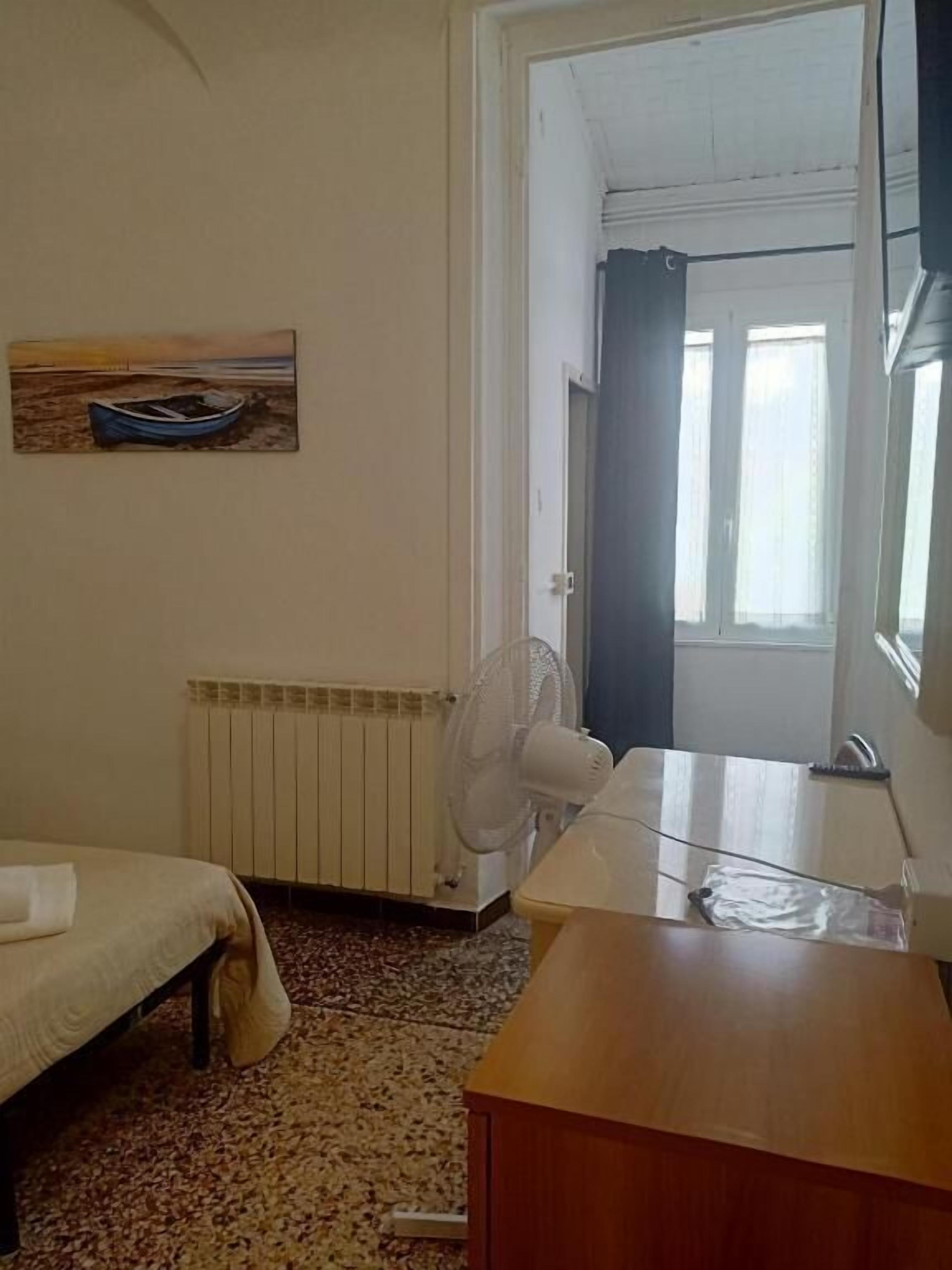 Neljän hengen economy-huone, näköala pihalle | Ilmainen Wi-Fi