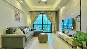 Comfort Apartment, 2 Bedrooms, Sea View | Living area | 55-inch flat-screen TV with cable channels, TV - R&F Princess Cove near CIQ by Stayrene (Johor Bahru)