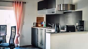 Apartment, eingeschränkter Seeblick | Gemeinschaftsküche