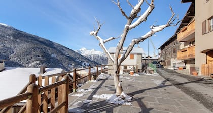 Appartement « Chalet Di Mont » avec terrasse privée, balcon et Wi-Fi