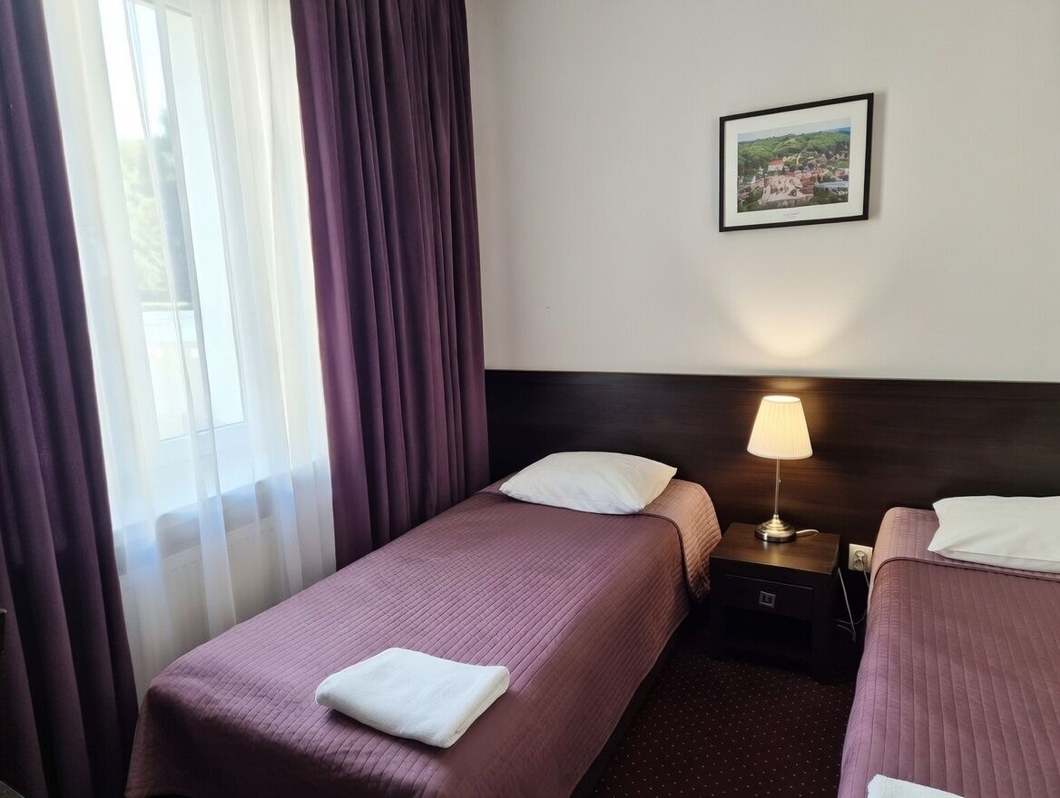 Chambre avec lits jumeaux | Rideaux occultants, fer et planche à repasser, Wi-Fi gratuit