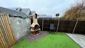 Apartamento, 1 quarto, para fumantes, varanda | Área para churrasco/piquenique
