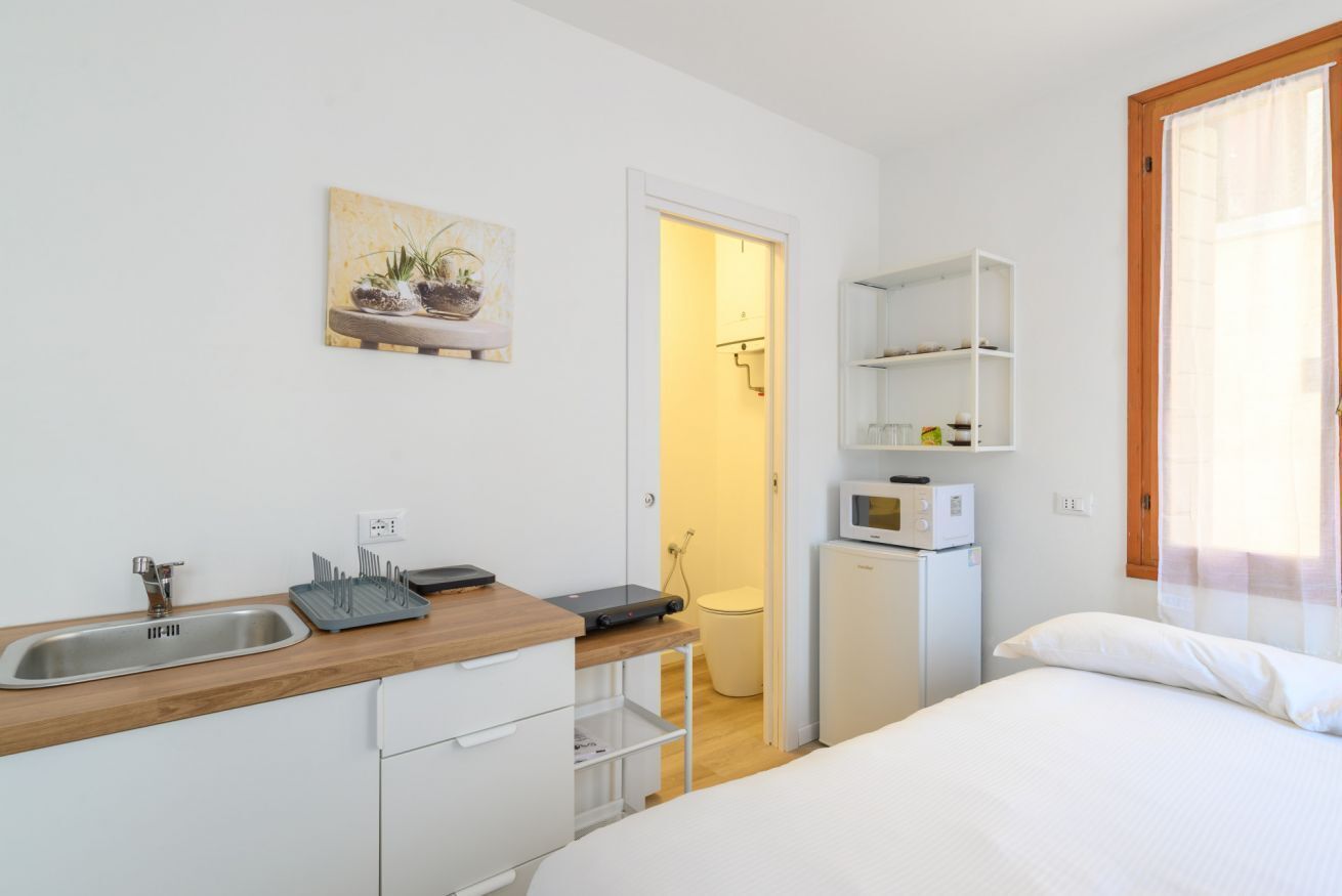 1 slaapkamer, een strijkplank/strijkijzer