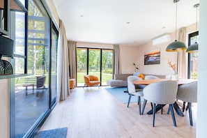 Dining - This Hofvilla Amalia for 6 pers. features three bedrooms, a spacious living area and a terrace with private hot tub. (Lattrop-Breklenkamp)