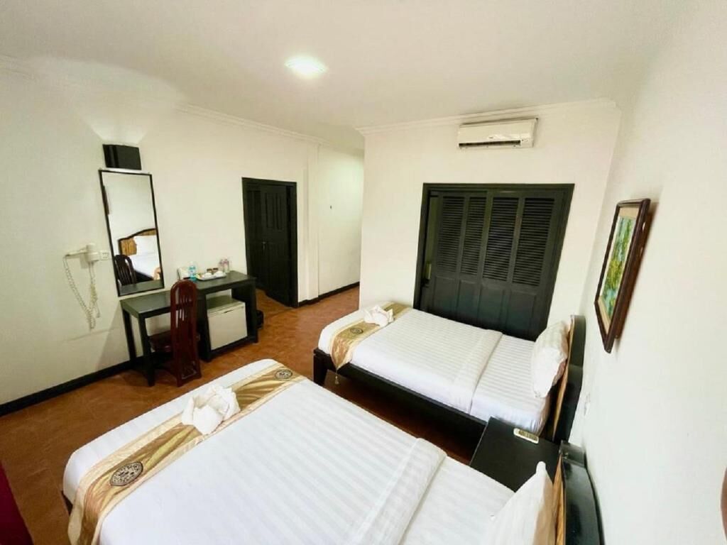 Family Room, Balcony, City View | Free WiFi