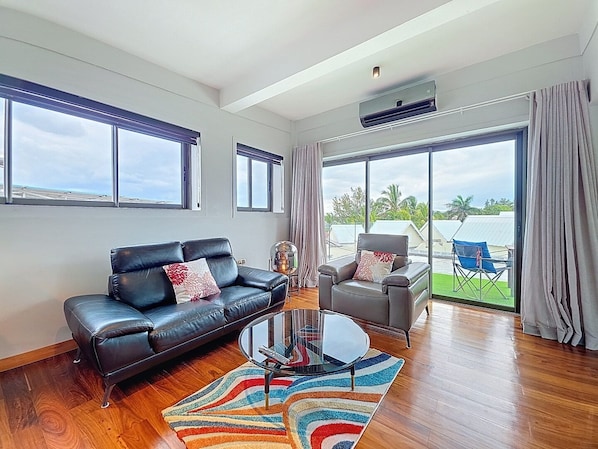 Deluxe Penthouse, Balcony, Sea View | Living area