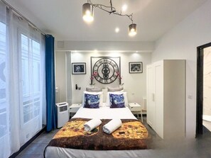 2 habitaciones, escritorio, tabla de planchar con plancha y wifi gratis 
