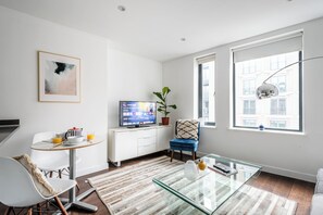 Appartement Deluxe, vue ville | Coin séjour