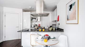 Apartamento luxo, vista para a cidade | Cozinha privada