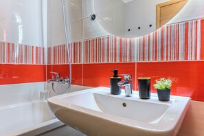 Apartment, City View | Bathroom | Free toiletries, hair dryer, slippers, towels - MoHost Urban - Apt with Stunning view (Brasov)