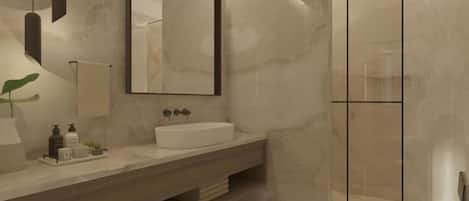 A modern bathroom with a marble vanity, a large mirror, a shower enclosure, and a toilet.