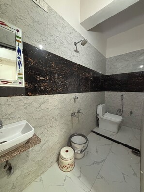 Dutxa, tovalloles, sabó i xampú 