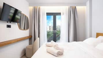 Apartamento luxo, vista para a cidade | Cofres nos quartos, cortinas blackout, quartos à prova de som