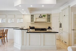 Fridge, microwave, oven, stovetop - The Residence on Swan – Absolute Riverfront Family Luxury with City Views (Maylands)