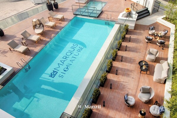 Outdoor pool - Manzil - 1BR in Arjan with City Views (Dubai)