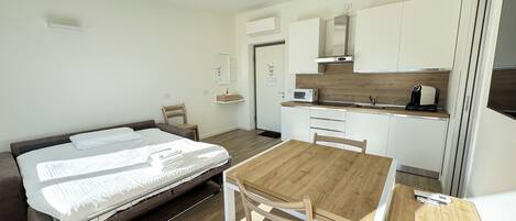 Coffres-forts dans les chambres, fer et planche à repasser