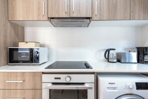 Leilighet, 1 soverom, kjøkken, byutsikt | Eget kjøkken | Kjøleskap, mikrobølgeovn, ovn og kokeplater