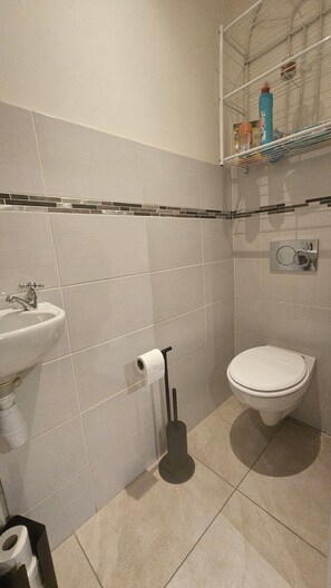 Hair dryer, towels, soap, toilet paper