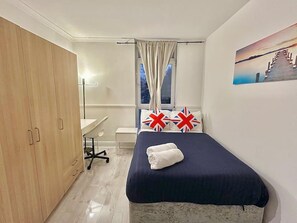 4 dormitorios, tabla de planchar con plancha, wifi gratis y ropa de cama