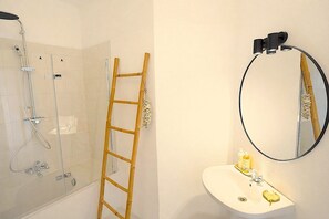 Hair dryer, towels, soap, shampoo