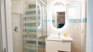 Comfort House, City View | Bathroom | Shower, hair dryer, towels, soap