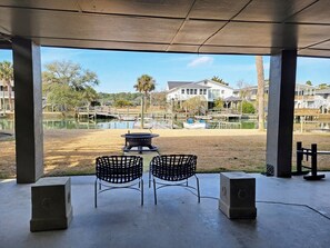 Terrace/patio - Vintage Canal Front Beach House, Private Dock, Easy Walk to Beach, Fire Pit (Pawleys Island)