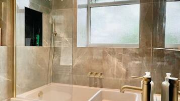 Shower, hair dryer, towels