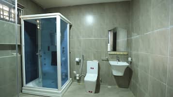 Deluxe Room, Balcony, City View | Bathroom | Free toiletries, bathrobes, slippers, towels