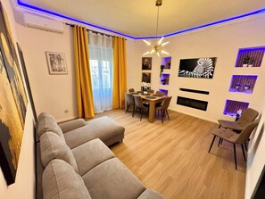 Smart TV, fireplace - Casa Arianna: Spacious 4BR Village Home – 5 Min Drive to Beach (Sardinia)