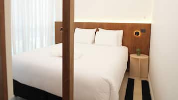 Standard Loft | Egyptian cotton sheets, premium bedding, down duvets, in-room safe