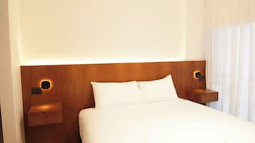 Deluxe Suite, Balcony, City View | In-room safe, blackout drapes, free WiFi