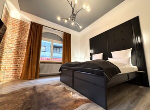 2 slaapkamers, een strijkplank/strijkijzer, gratis wifi, beddengoed
