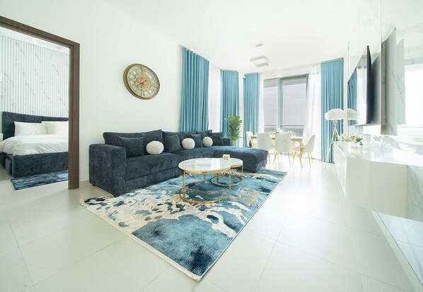 TV - Spacious Beachfront 1 Bed in Blue Bay Walk (Ajmal Makan)
