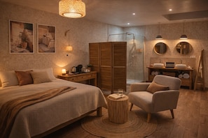 A modern bedroom with a bed, bedside table, lamp, chair, and a small round table with a book and glass. - Le Jardin d'Elusa (Eauze)