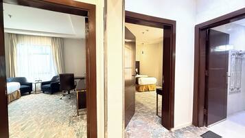 Family Suite | In-room safe, desk, laptop workspace, soundproofing