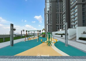 Children's area - Manzil - 1BR in Sobha with City Views (Dubai)
