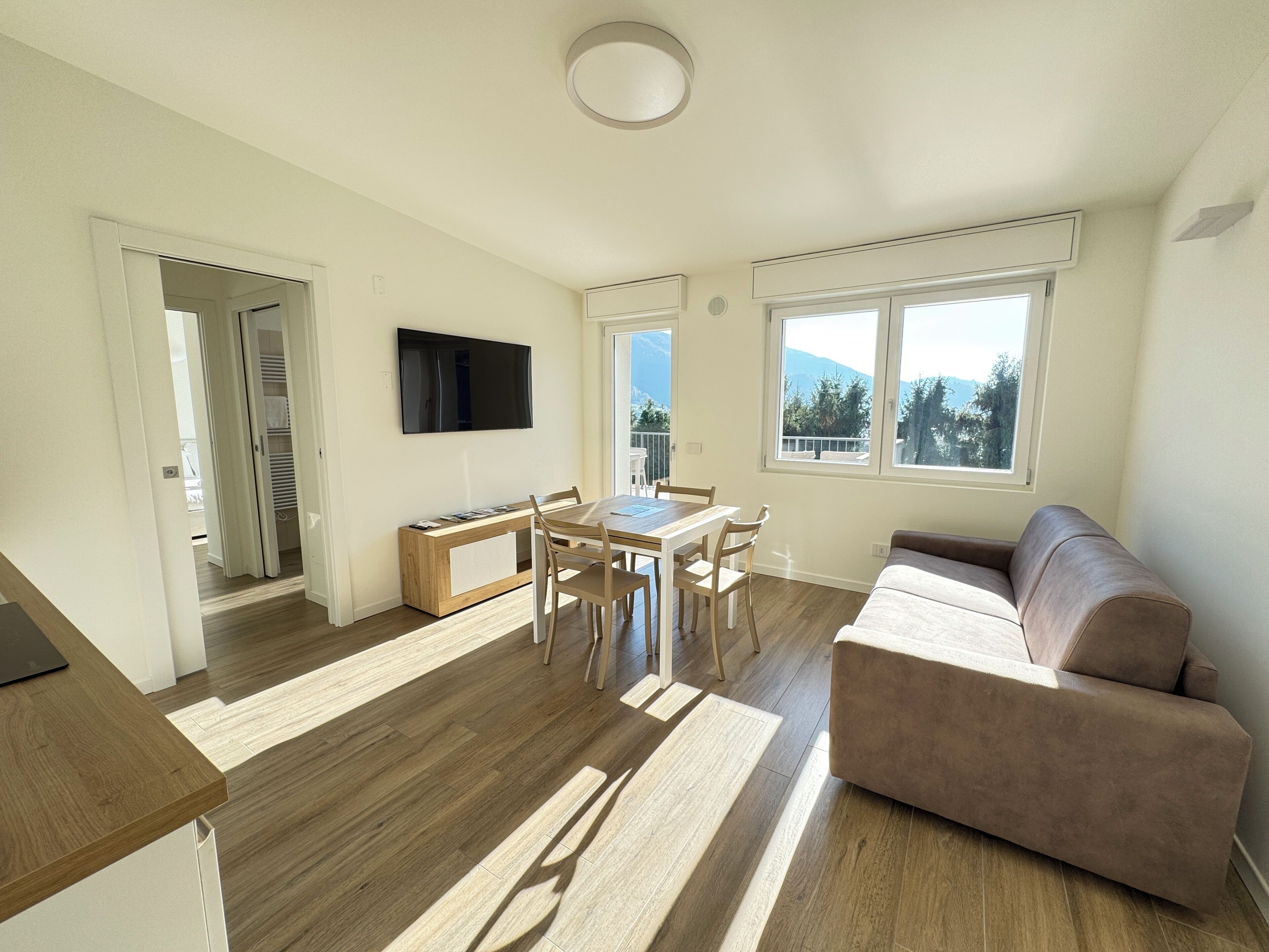 Appartamento Malga Lunga | Area keluarga | Smart TV 40-inci dengan saluran TV kabel