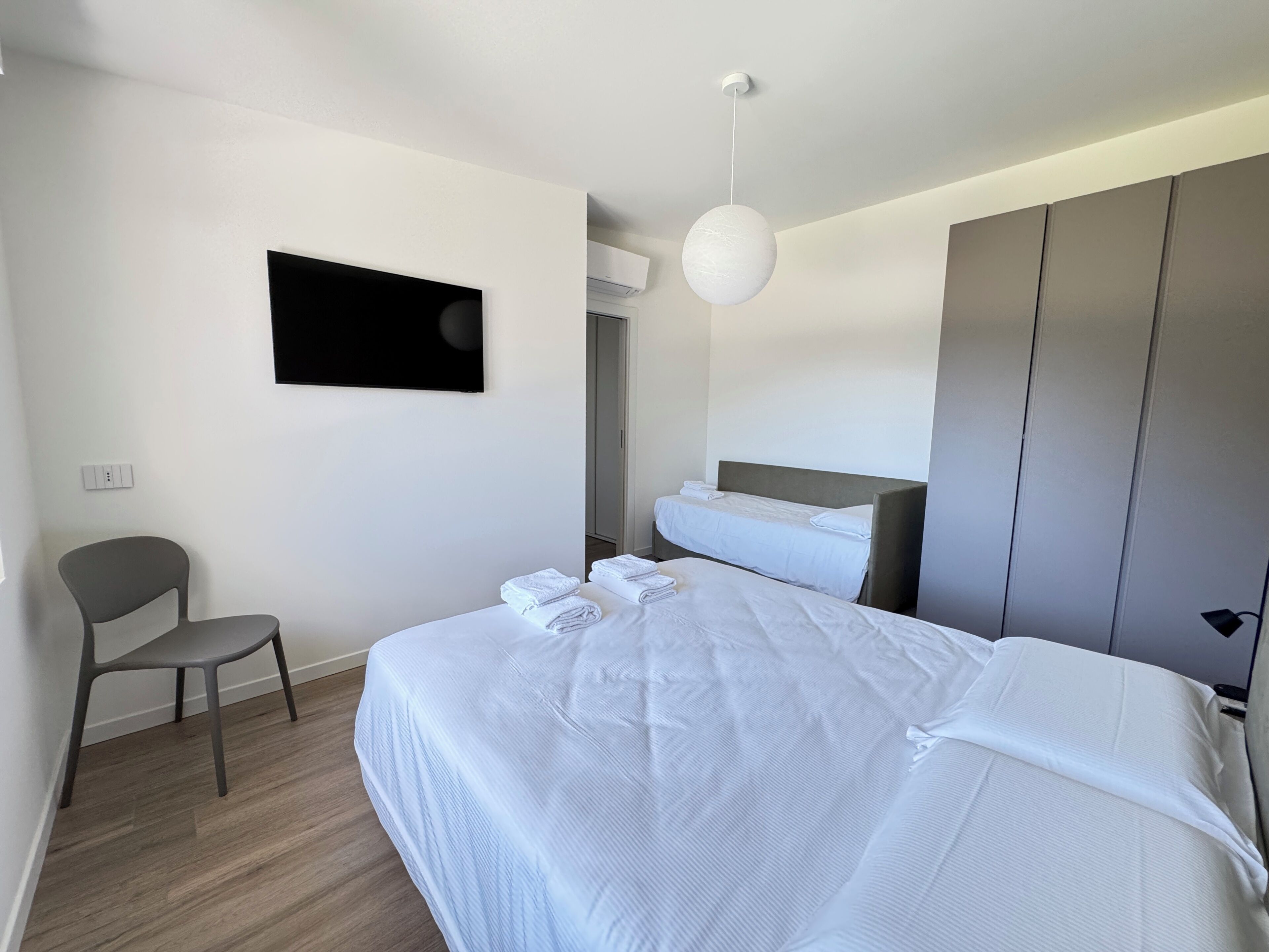 Appartement, balkon, uitzicht op bergen | Een kluis op de kamer, een strijkplank/strijkijzer, gratis babybedden