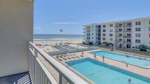A heated pool - Sea Coast Serenity | Oceanview 2BR Retreat w/ 2 Pools (New Smyrna Beach)