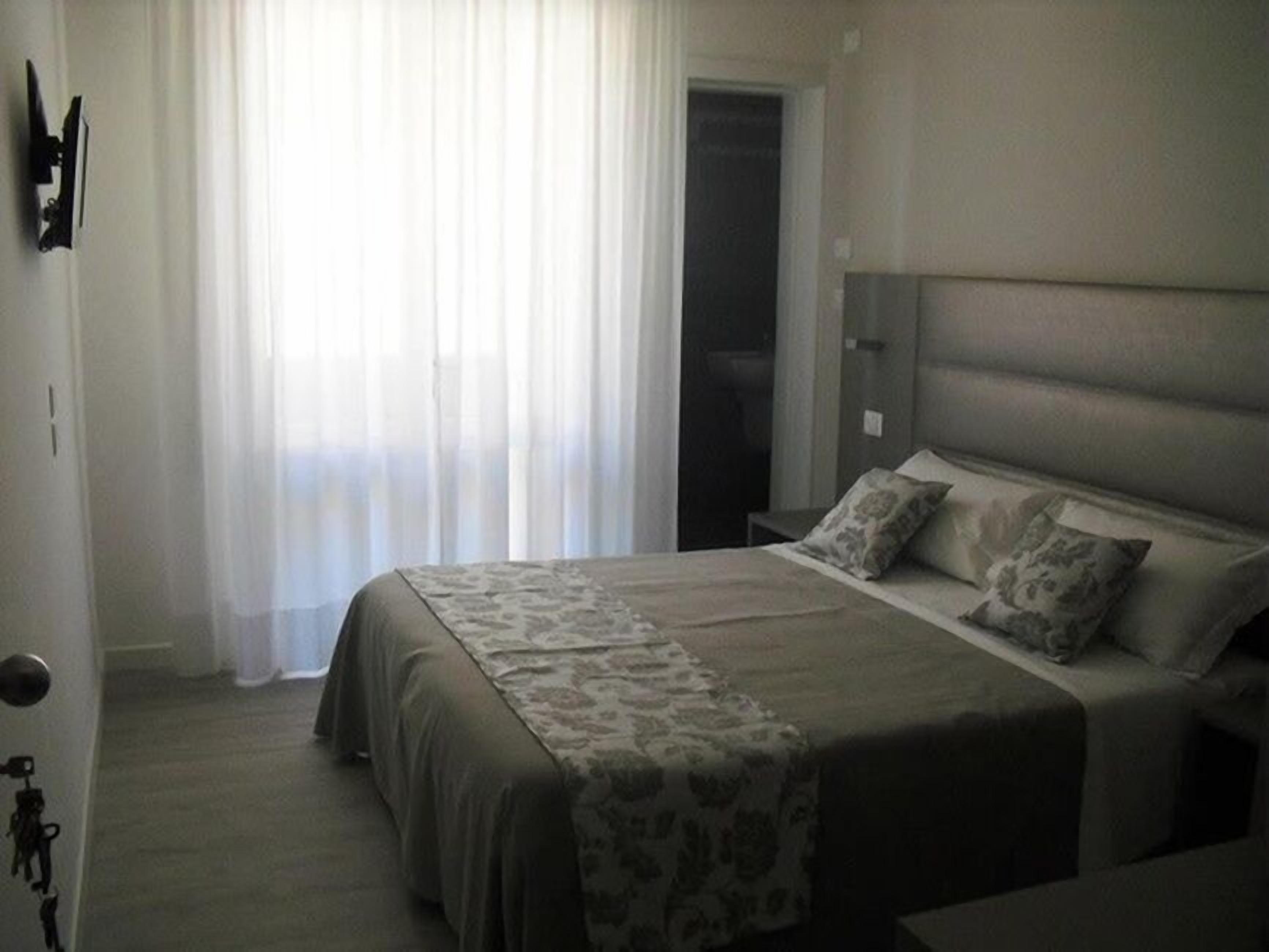 Family Room, 2 Bedrooms | In-room safe, desk, free WiFi, bed sheets