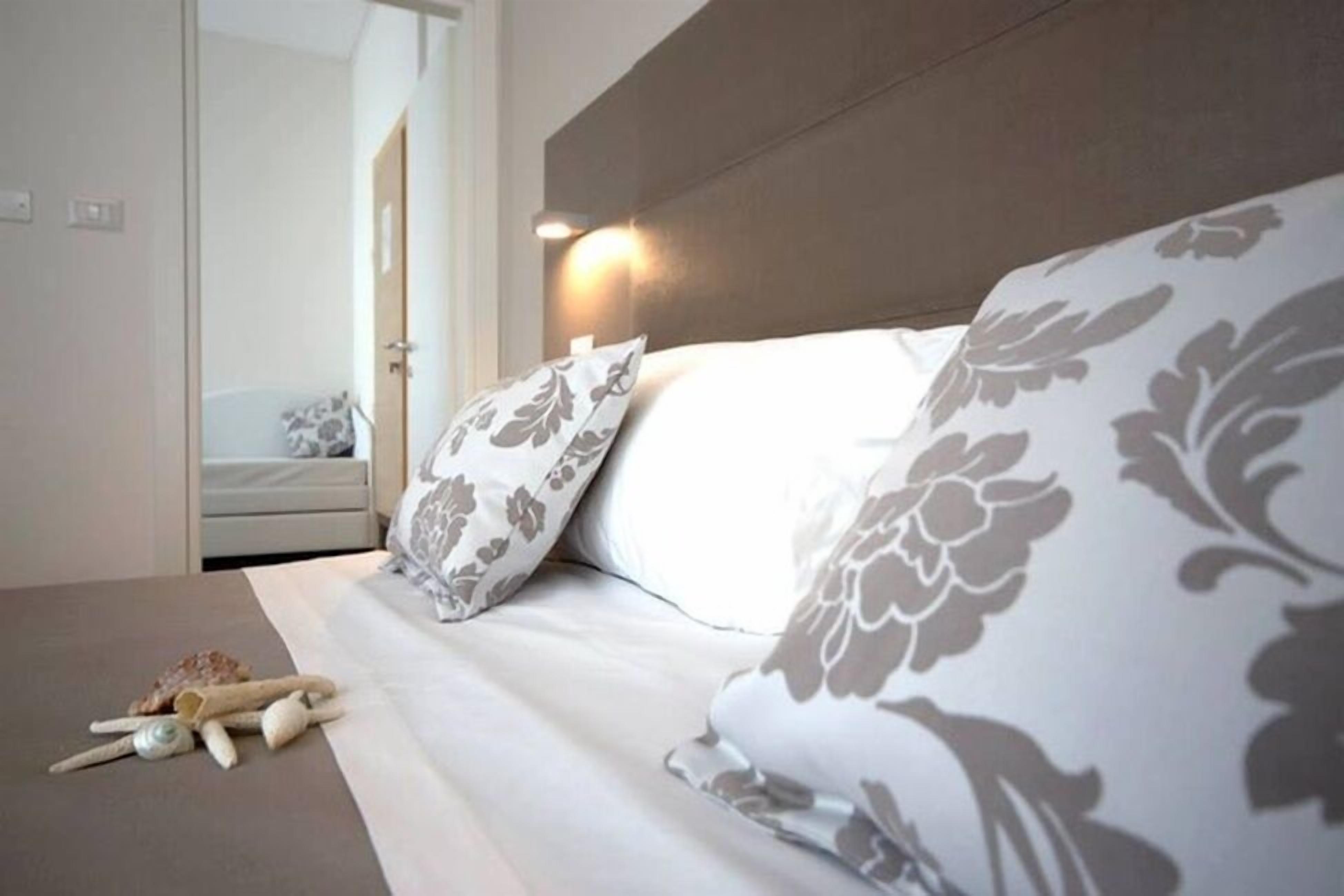 Family Room, 2 Bedrooms, Sea View | In-room safe, desk, free WiFi, bed sheets